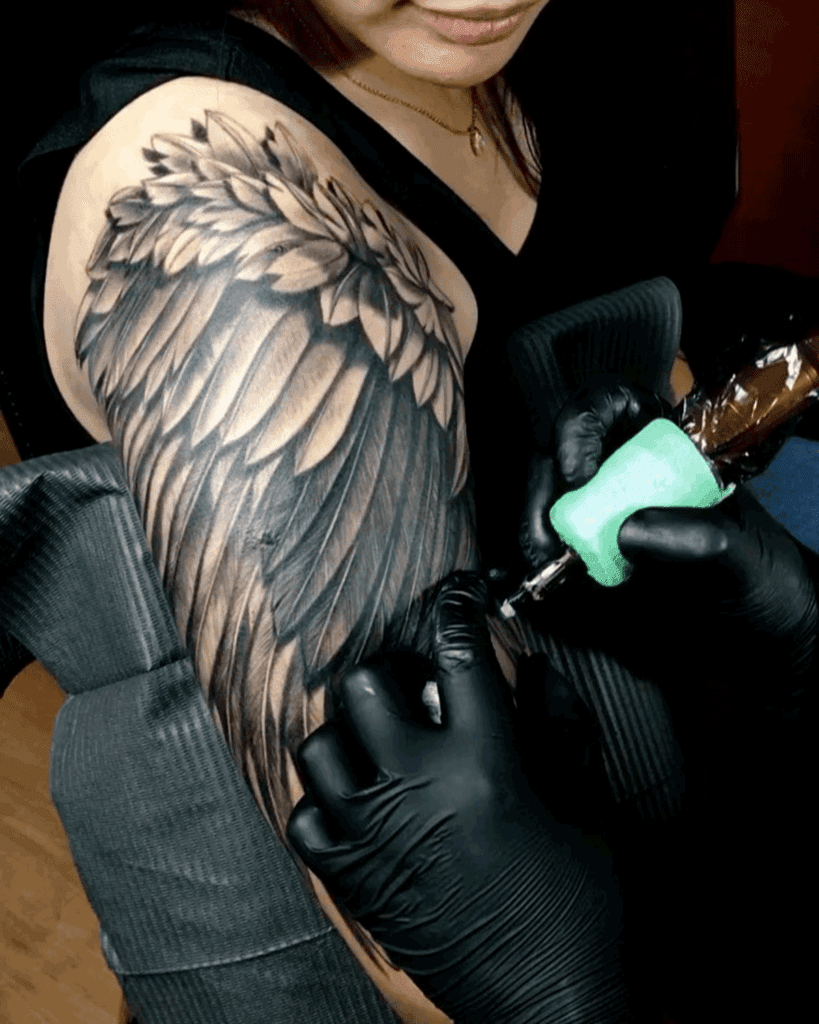 Wings Bicep Tattoo