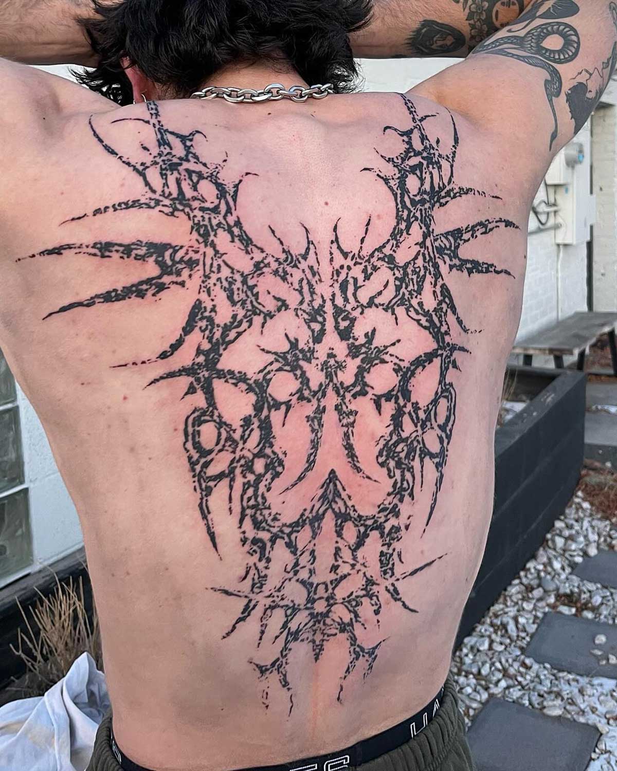 Cyber sigilism back tattoo