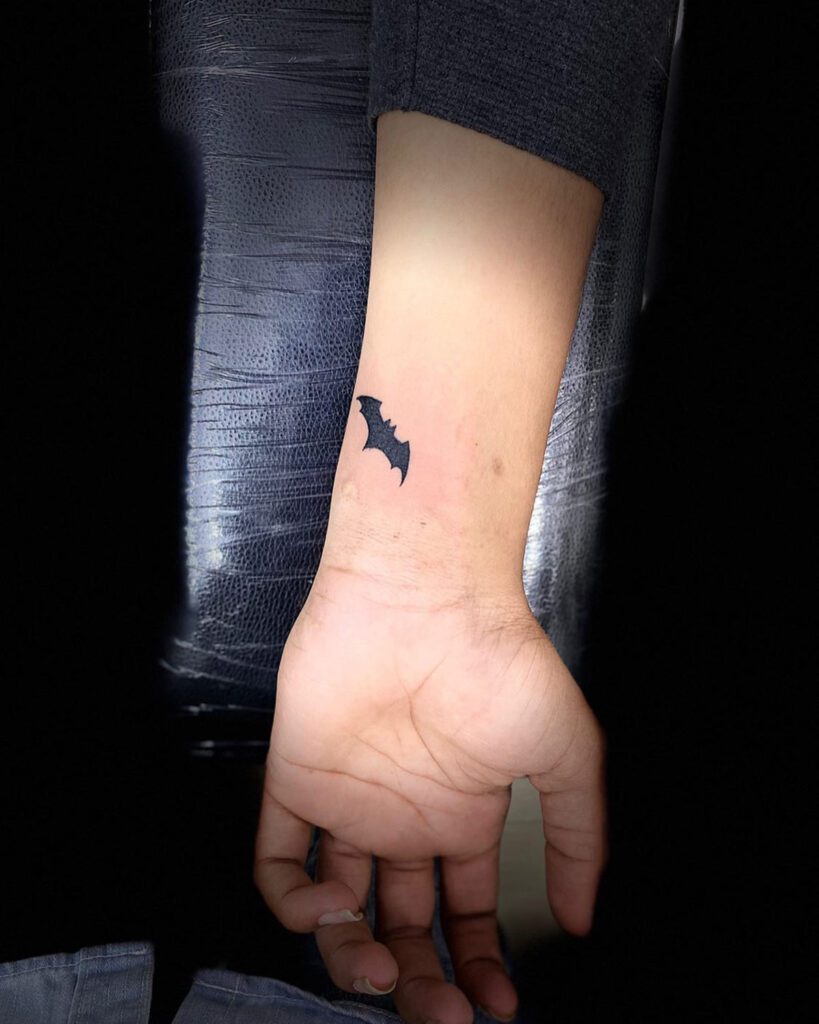 Minimalist & Small Bat Tattoo