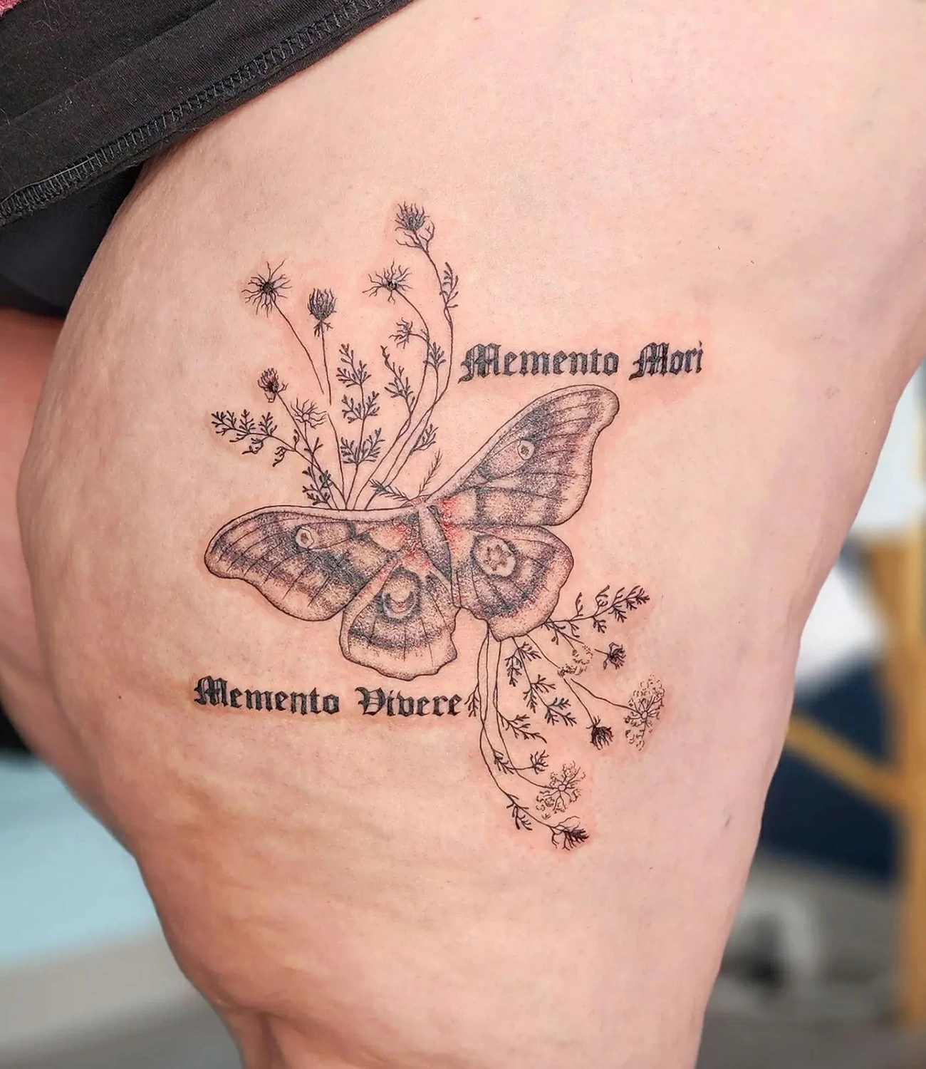 memento mori and memento vivere tattoo: A combined tattoo featuring both "memento mori" and "memento vivere," possibly arranged in a complementary design.
