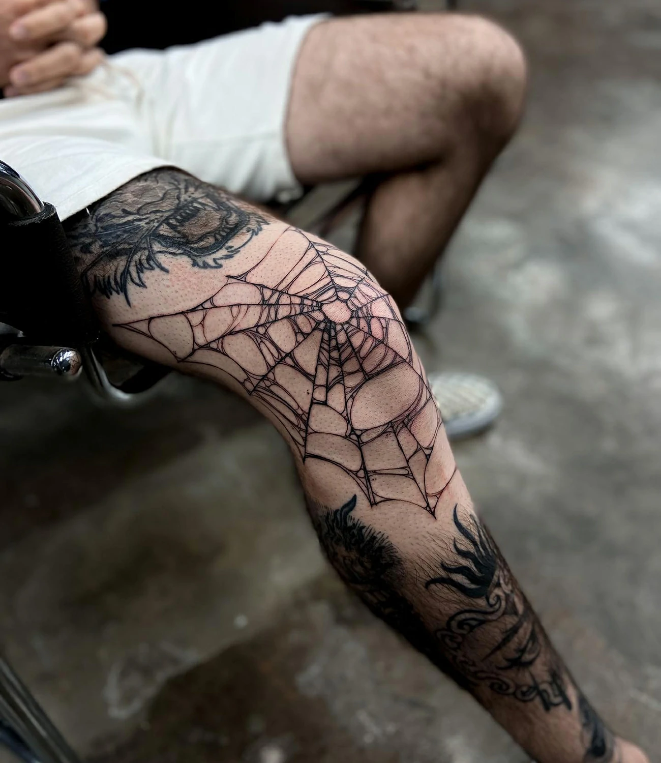 Spider web tattoo