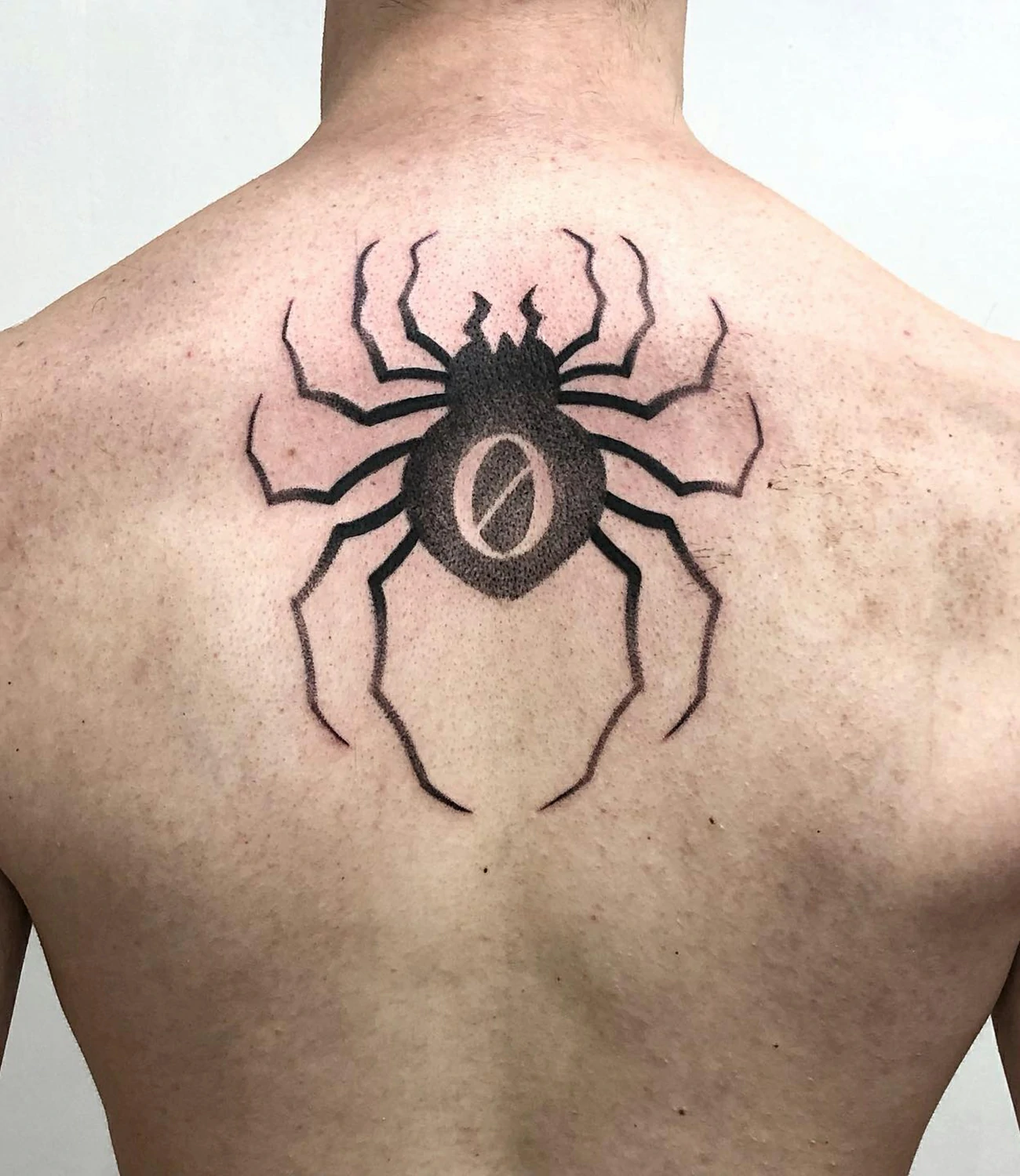 Chrollo spider tattoo