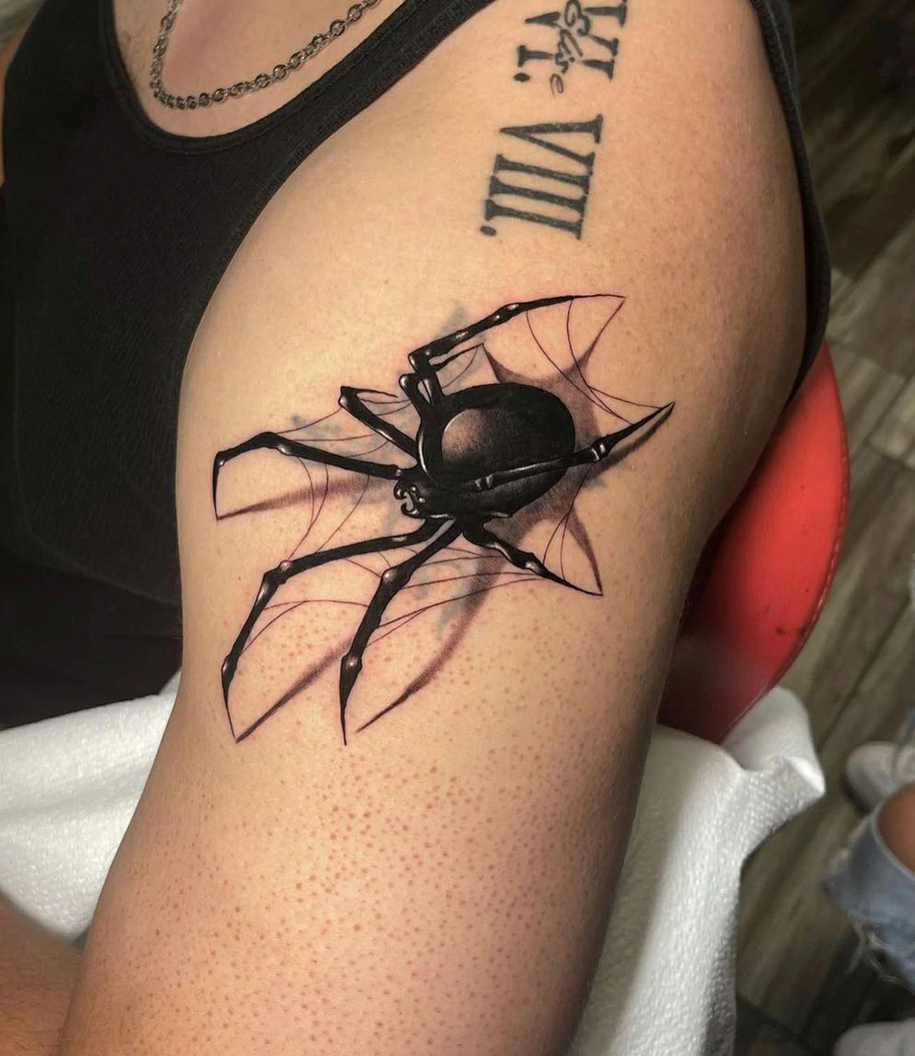 Realistic spider tattoo