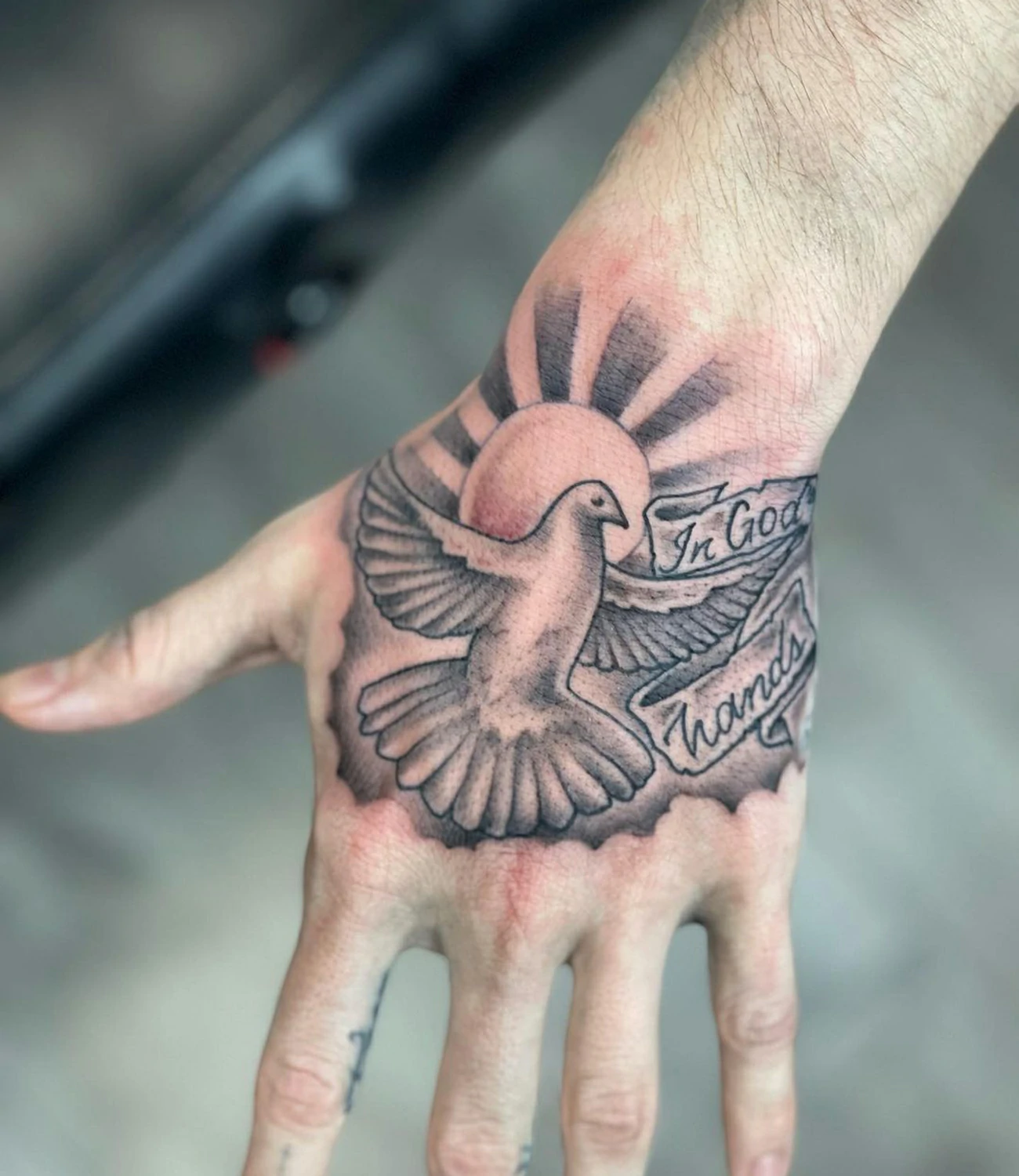Dove Hand Tattoo