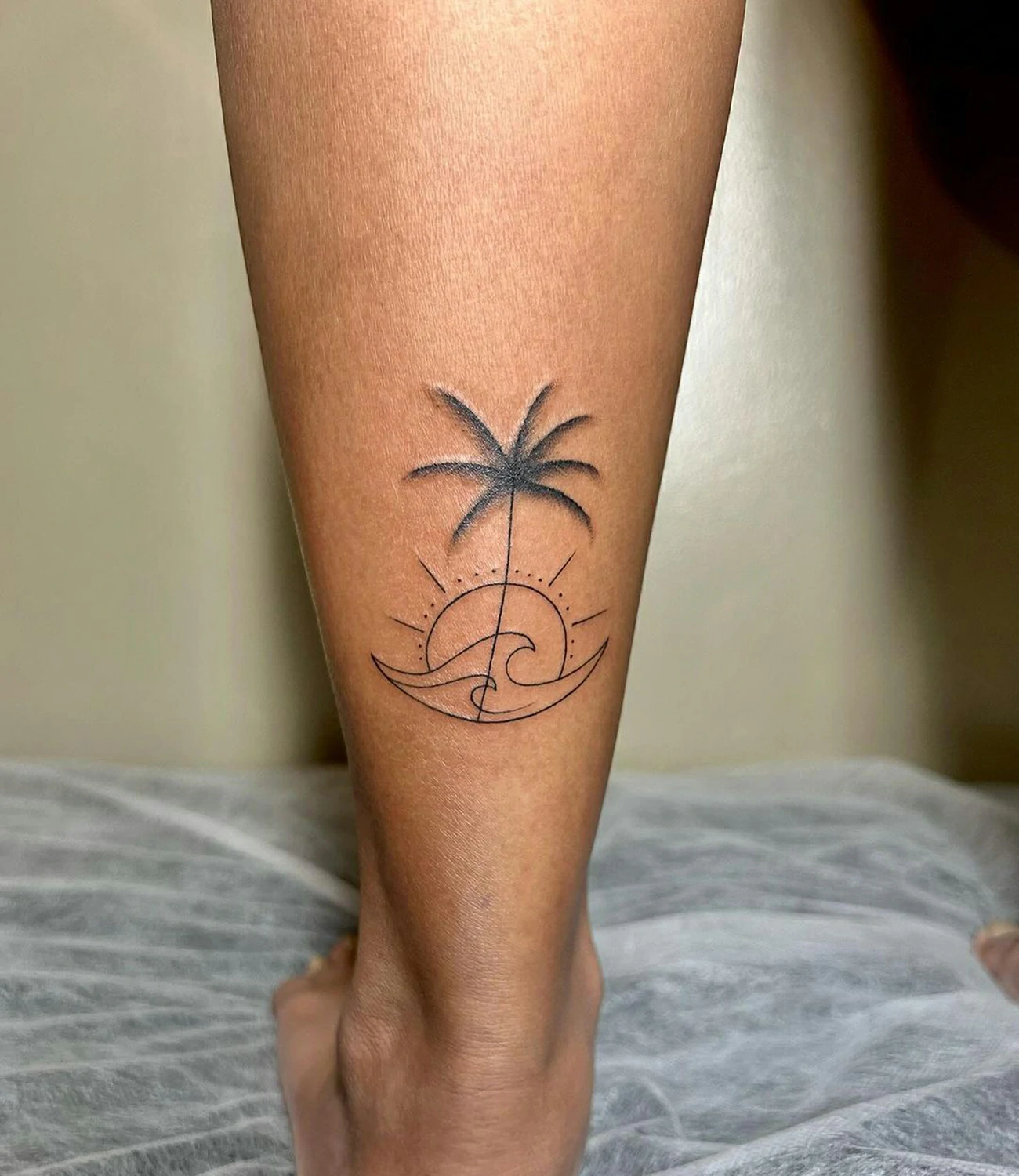 Minimalist Palm Tree and Wave Tattoo