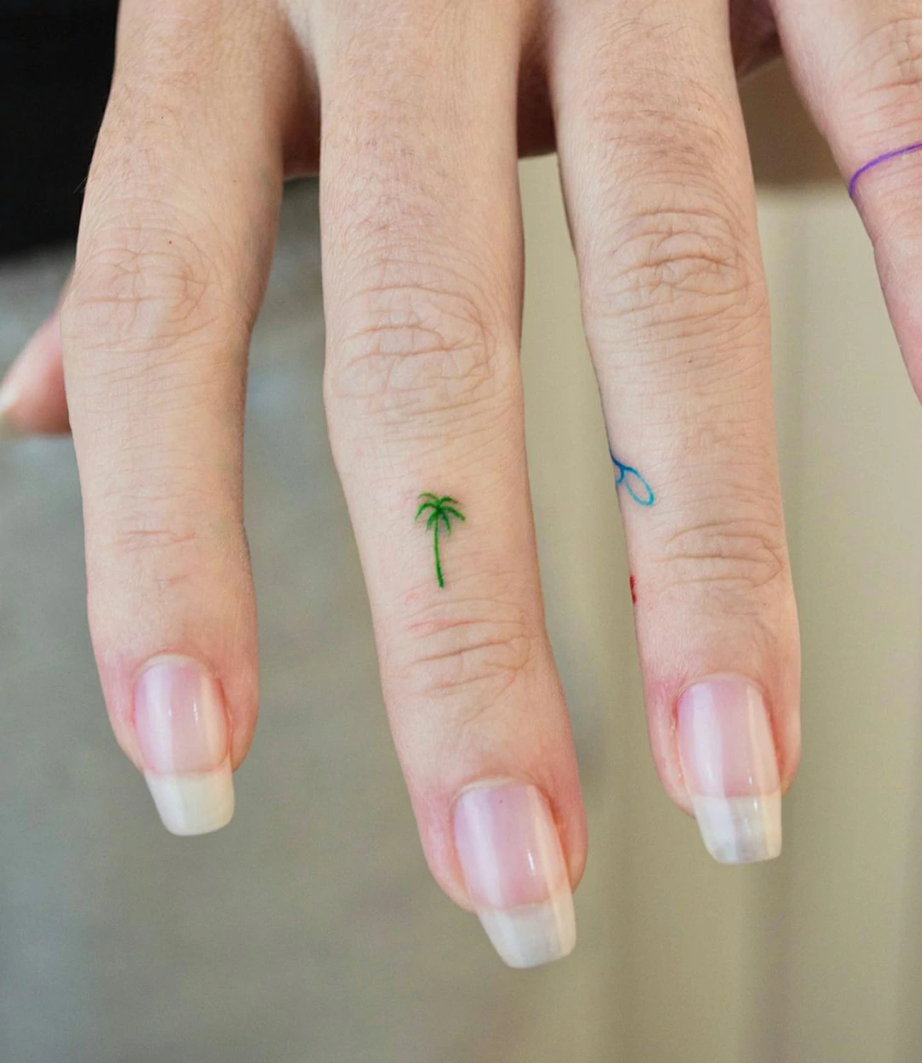 Palm Tree Finger Tattoo