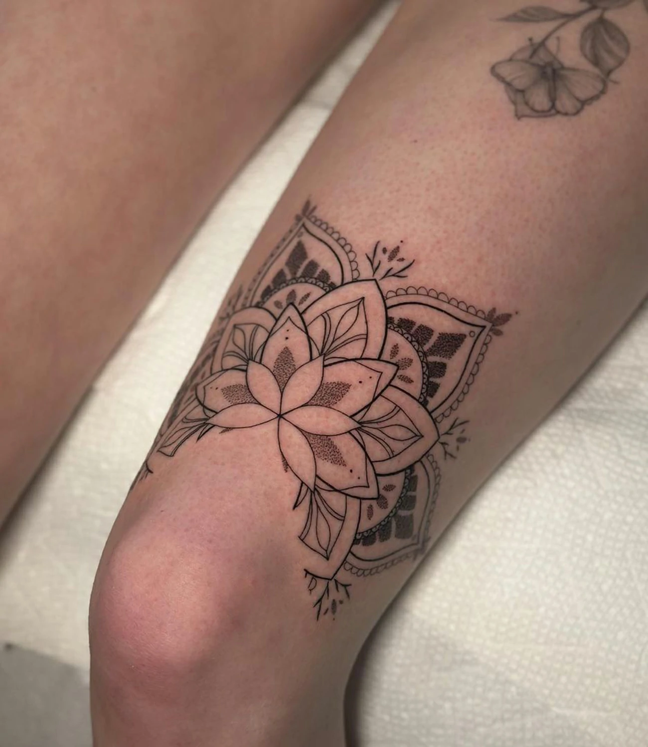 Above Knee Tattoo