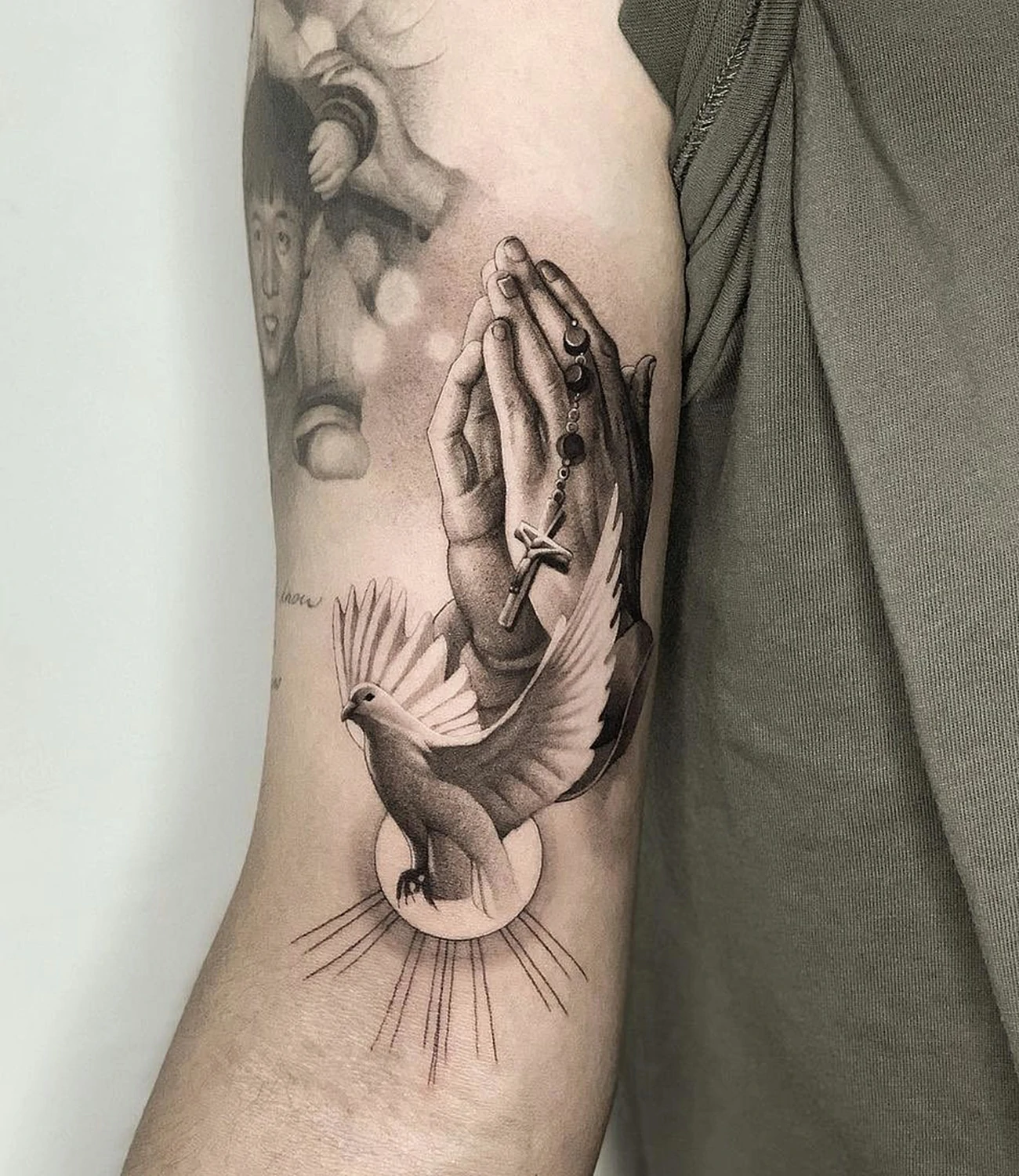 Hands and Dove Tattoo
