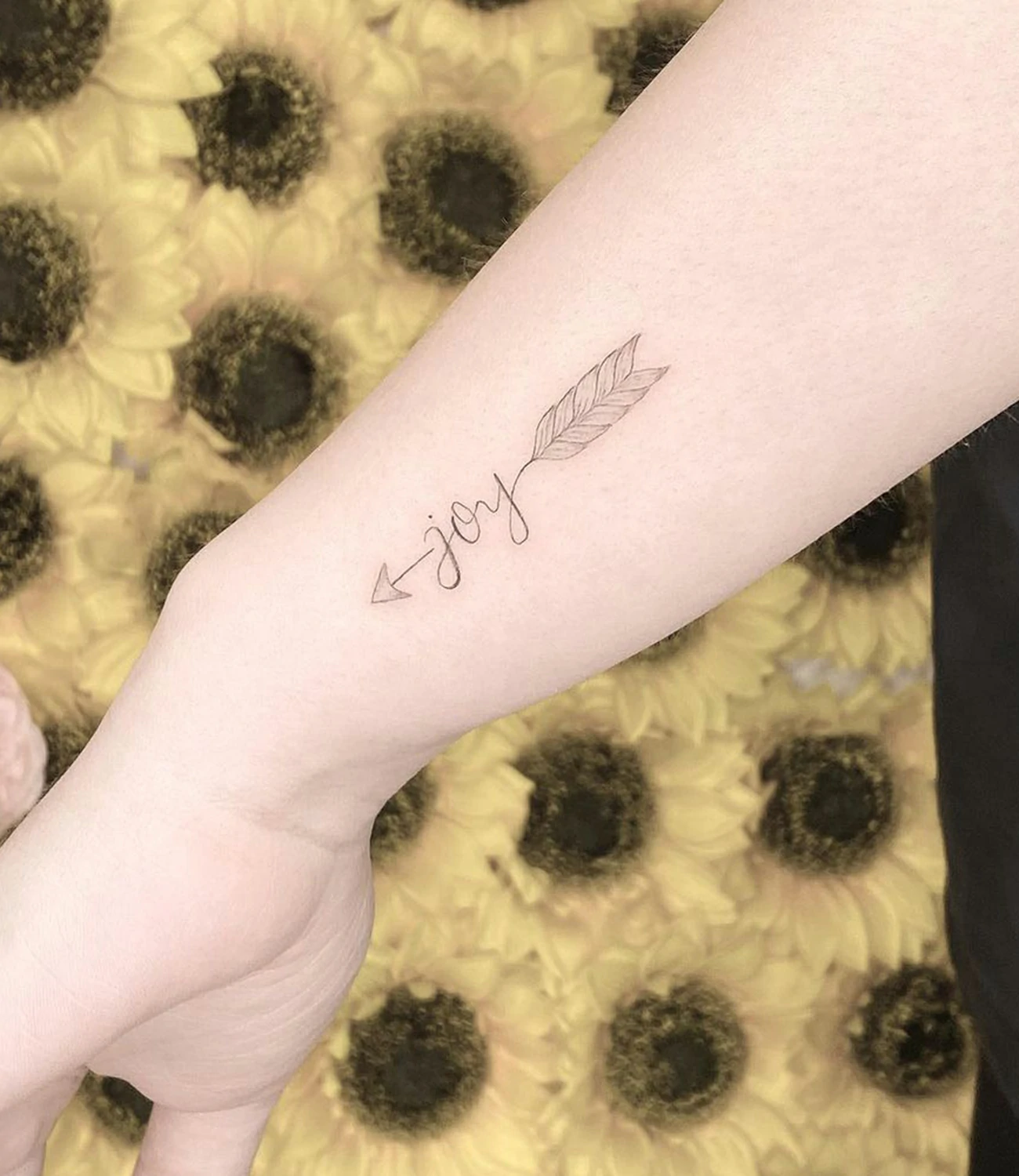 Small Arrow Tattoo