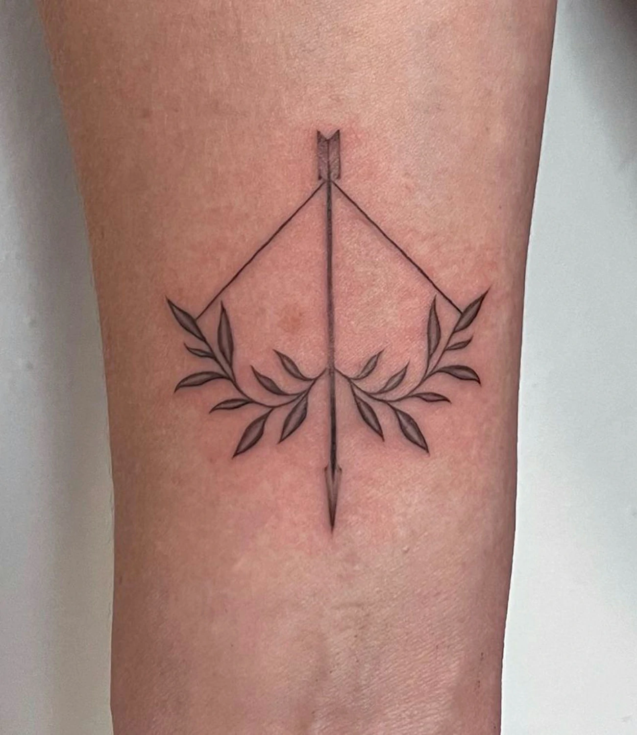 Leaf and Arrow Tattoo