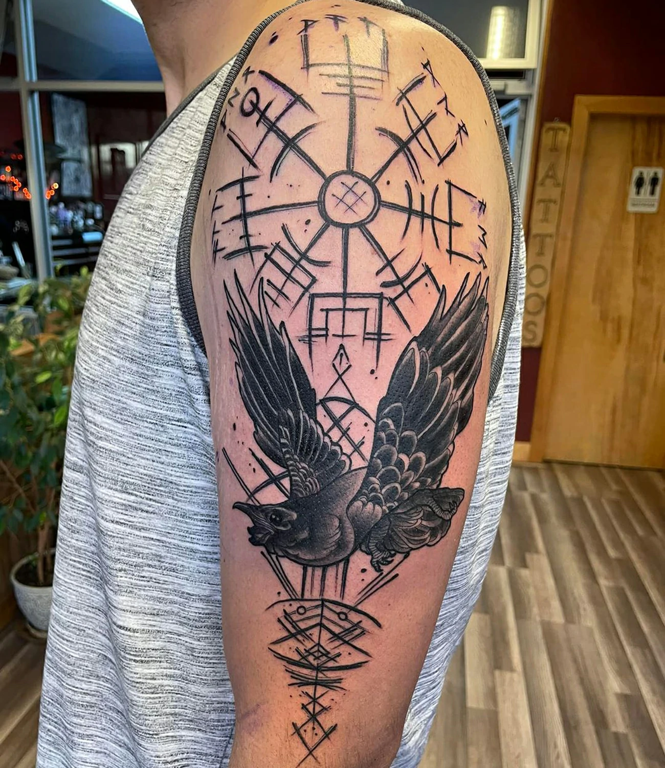 Nordic raven tattoo: A raven tattoo inspired by ancient Nordic designs and mythology.