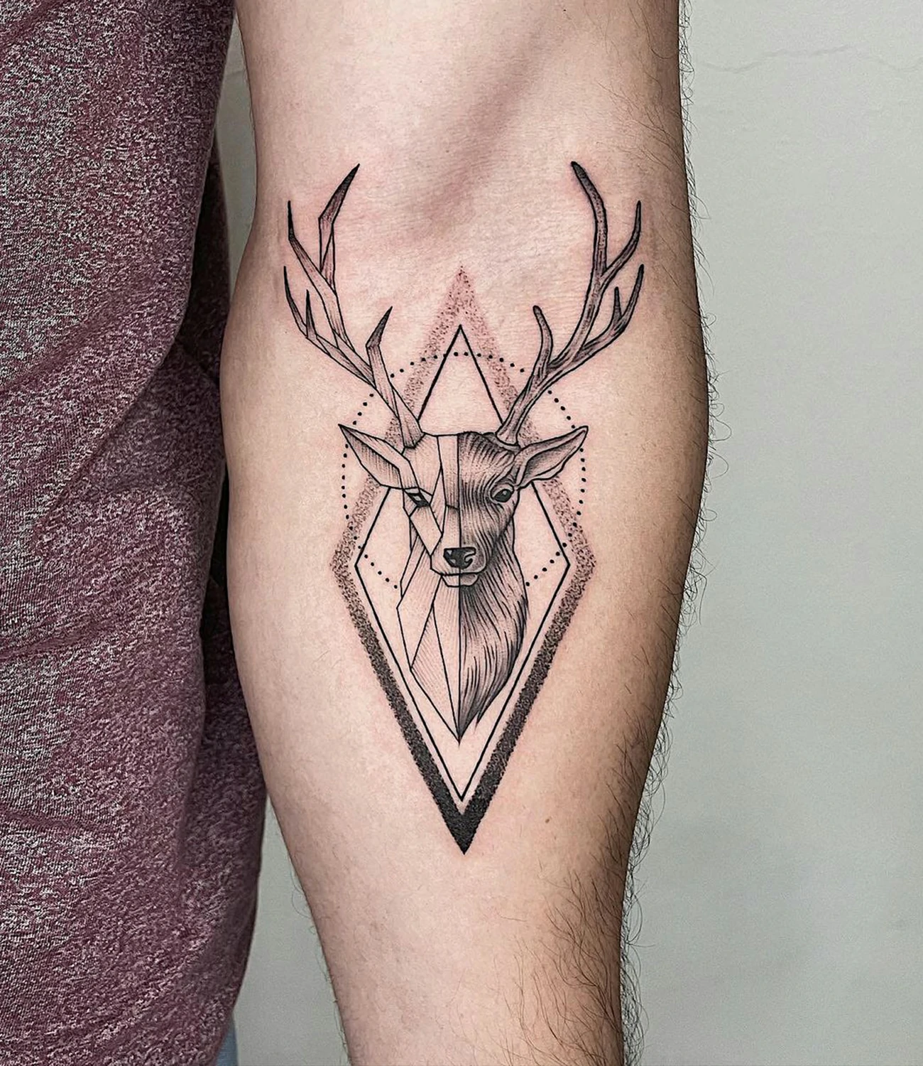 geometric deer tattoo