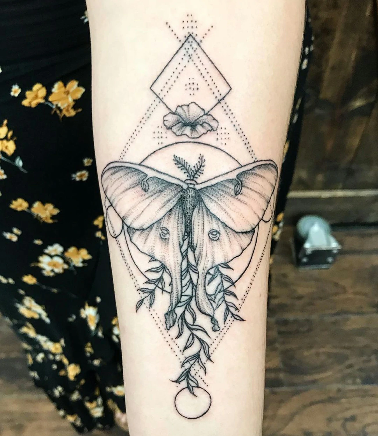 geometric moth tattoo