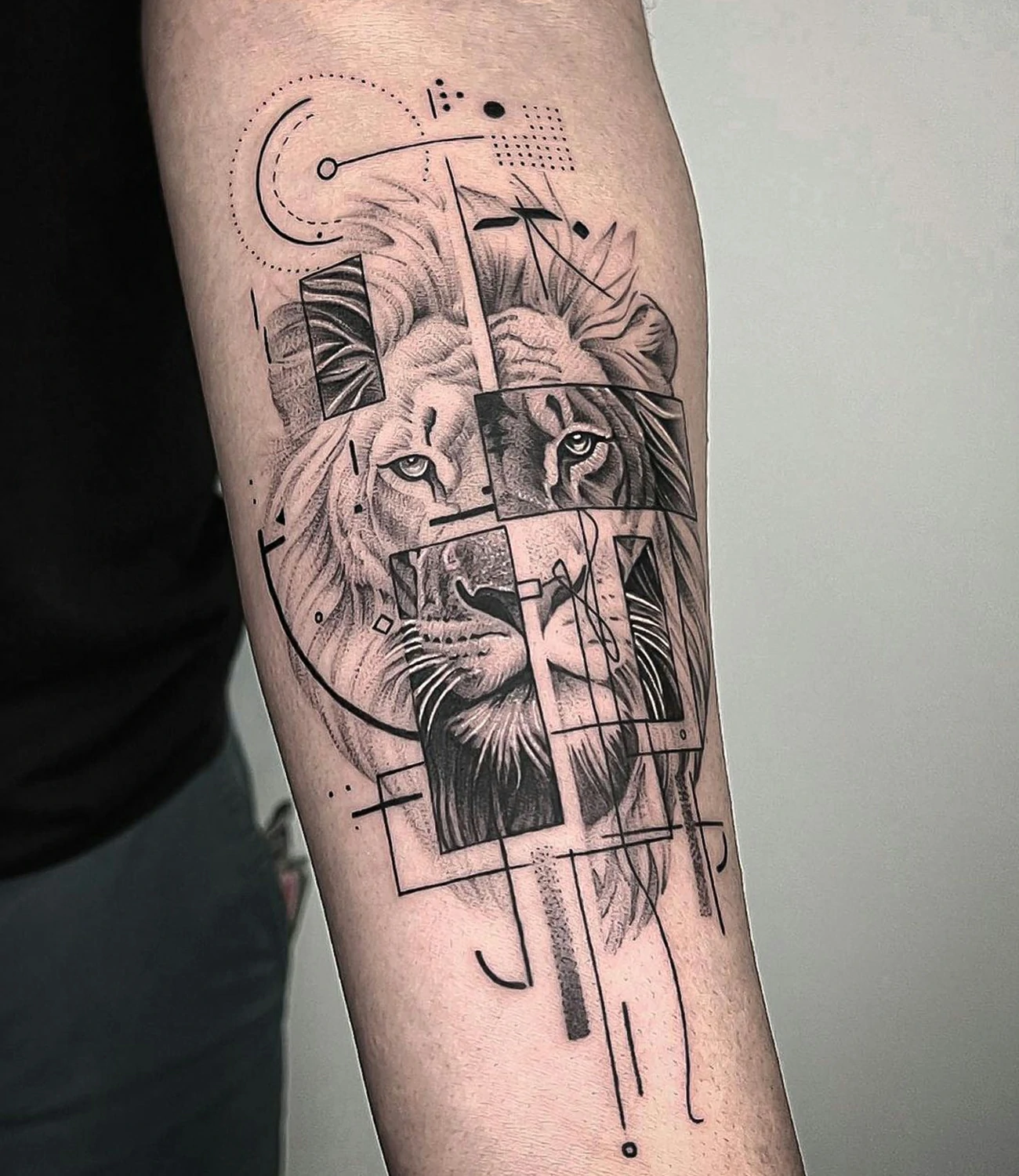 Geometric Lion Tattoo: Geometric lion tattoos combine the regal image of a lion with precise geometric shapes, symbolizing courage and leadership.