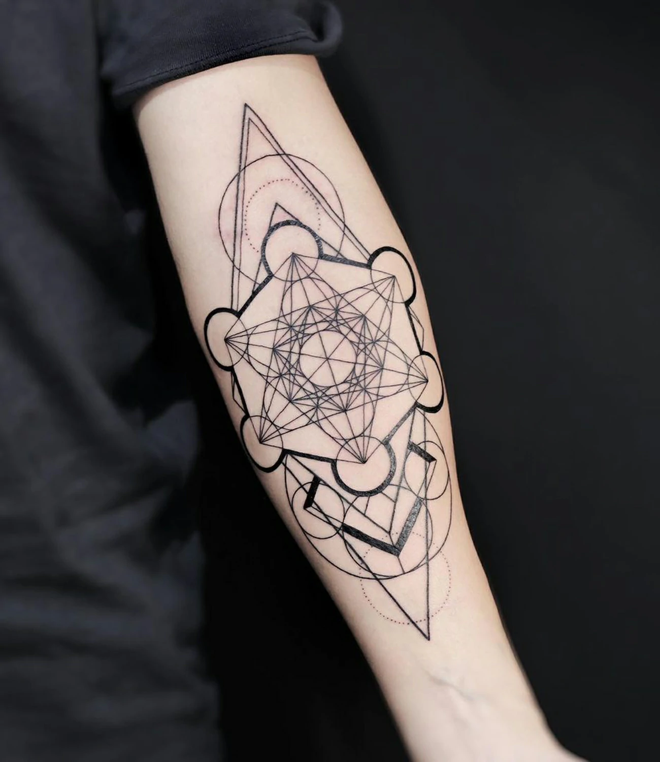 Geometric Shapes Tattoo: Geometric shapes tattoos feature arrangements of basic shapes like triangles, circles, and squares, symbolizing clarity and balance.