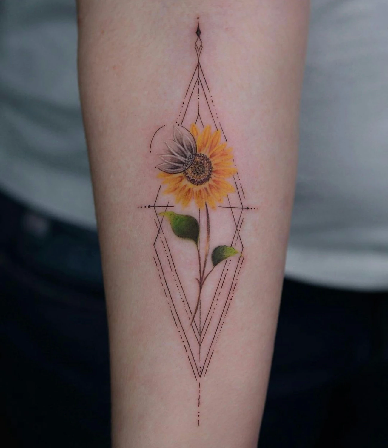 geometric sunflower tattoo
