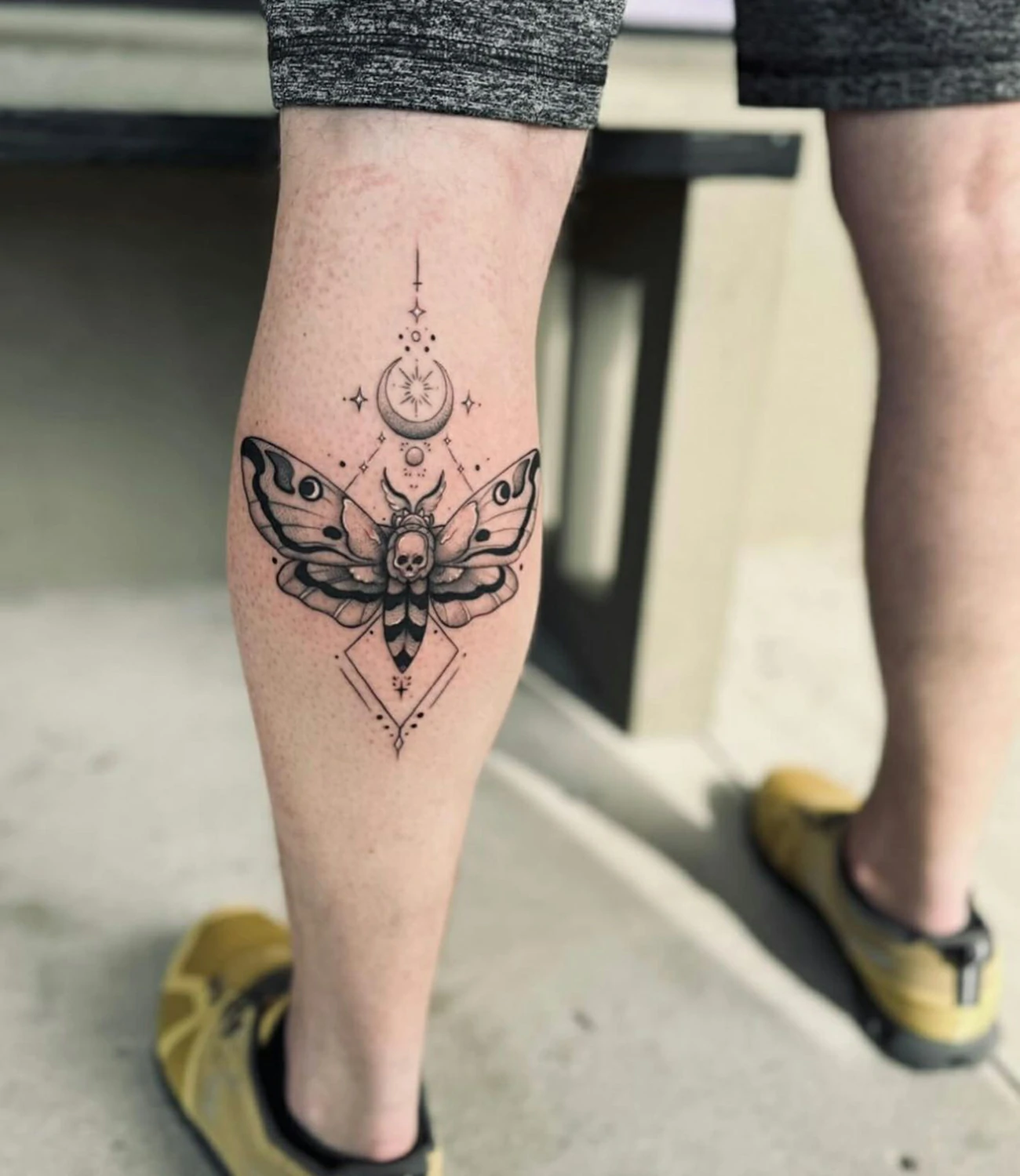 Geometric Death Moth Tattoo: Geometric death moth tattoos combine the eerie image of a death moth with geometric shapes, symbolizing transformation and mortality.