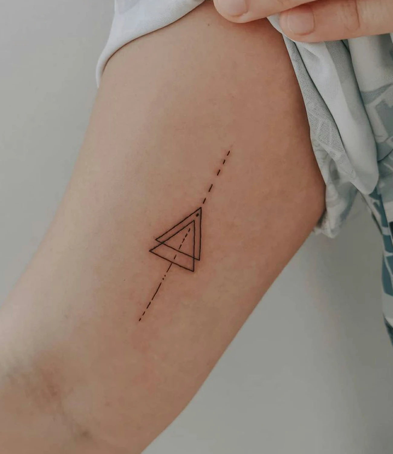 geometric triangle tattoo