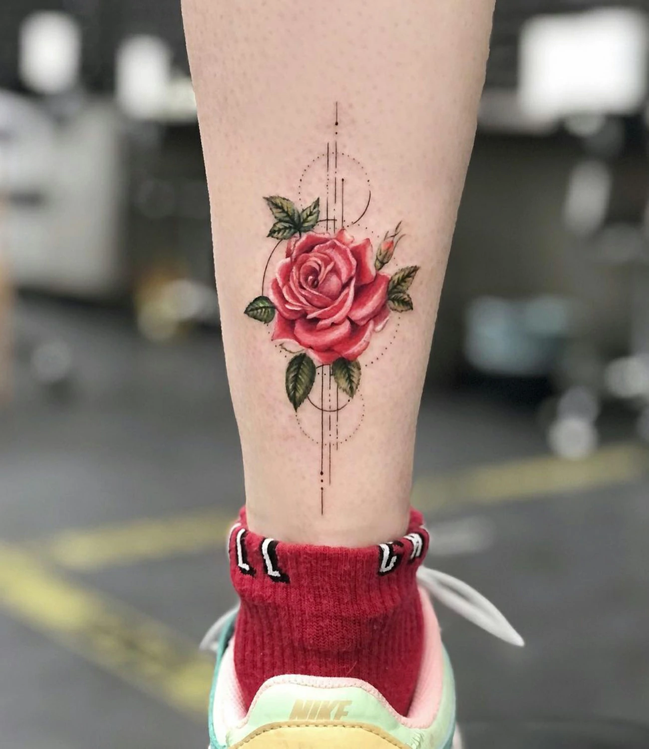 rose geometric tattoo