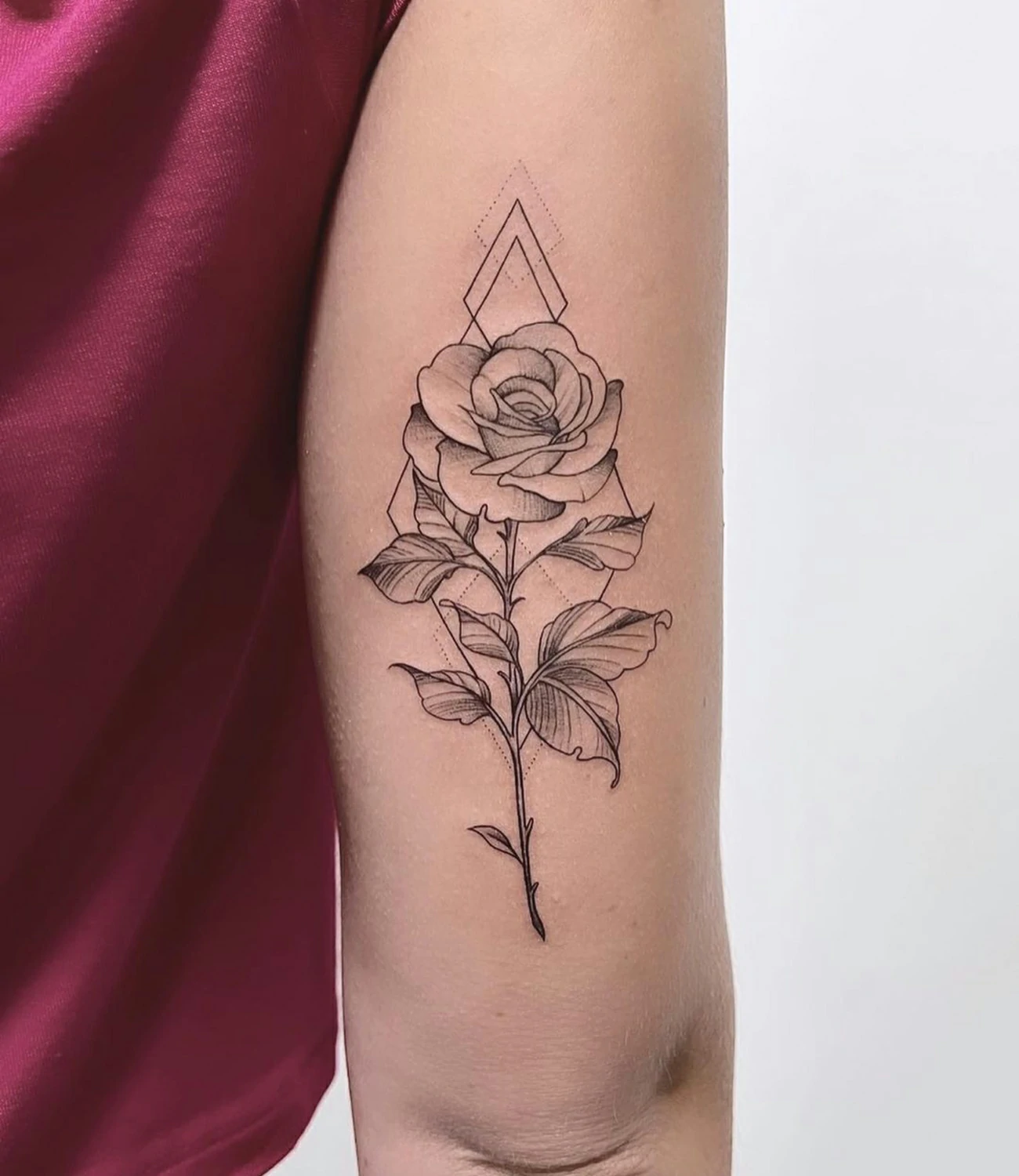 Geometric Rose Tattoo: Geometric rose tattoos combine the beauty of a rose with geometric shapes, symbolizing love and the harmony of nature.