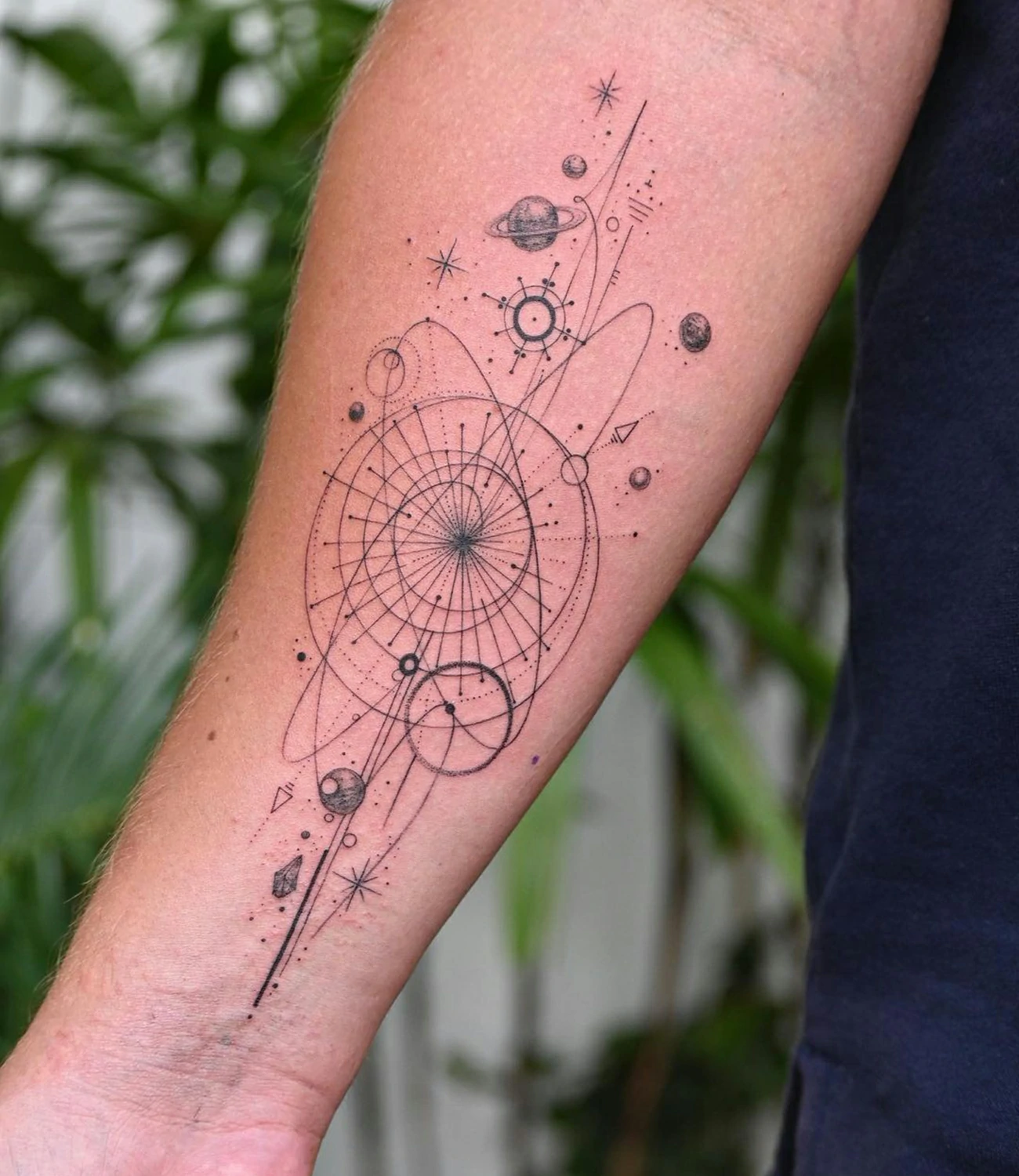 geometric galaxy tattoo