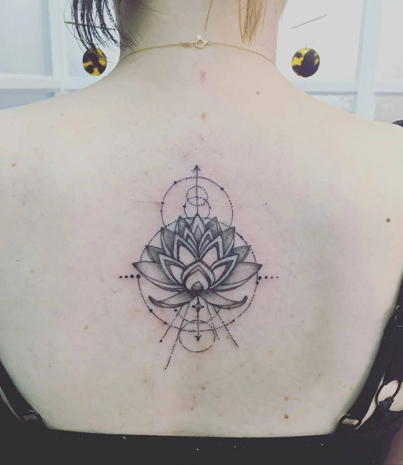 lotus geometric tattoo
