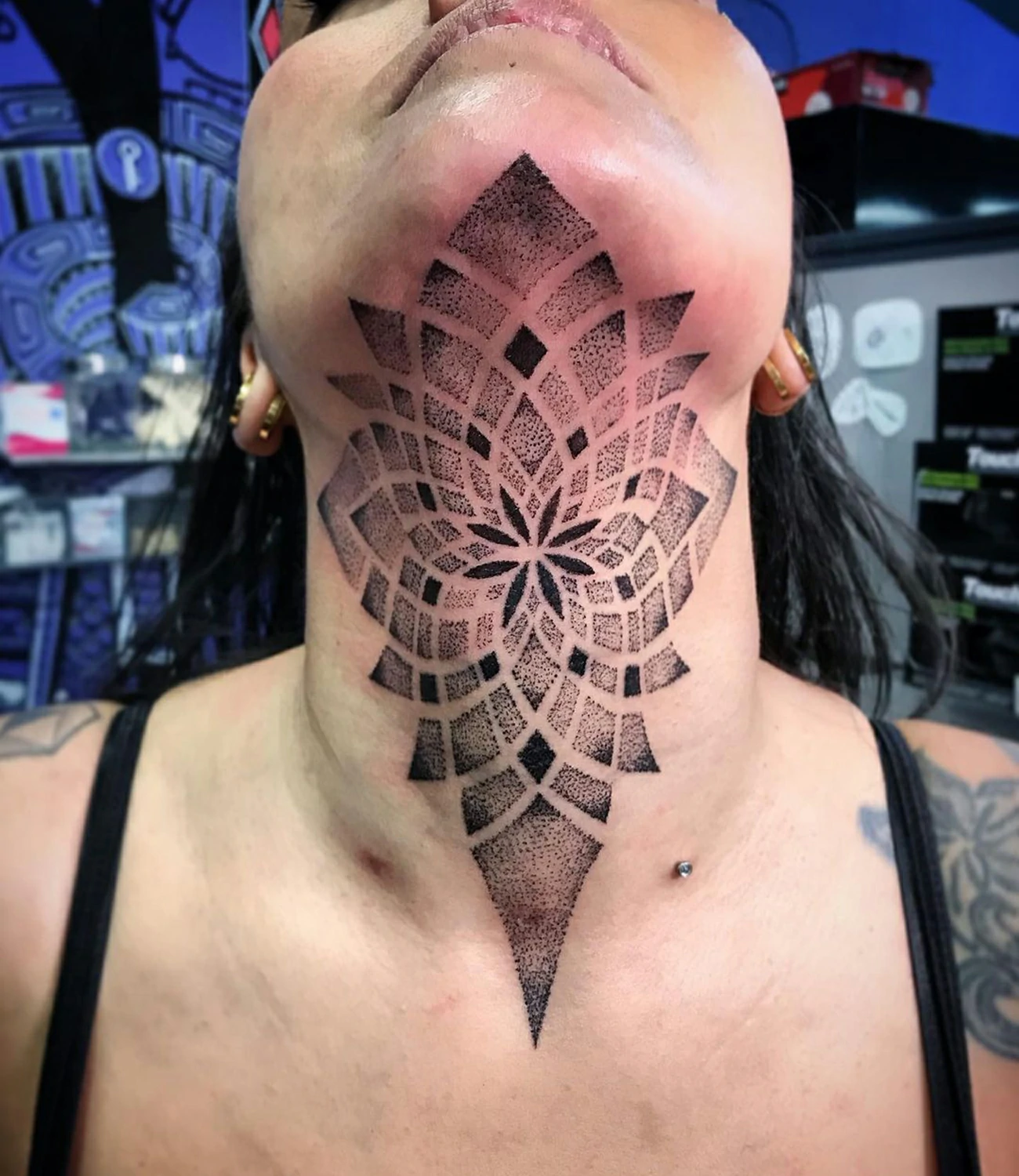 geometric dotwork neck tattoo
