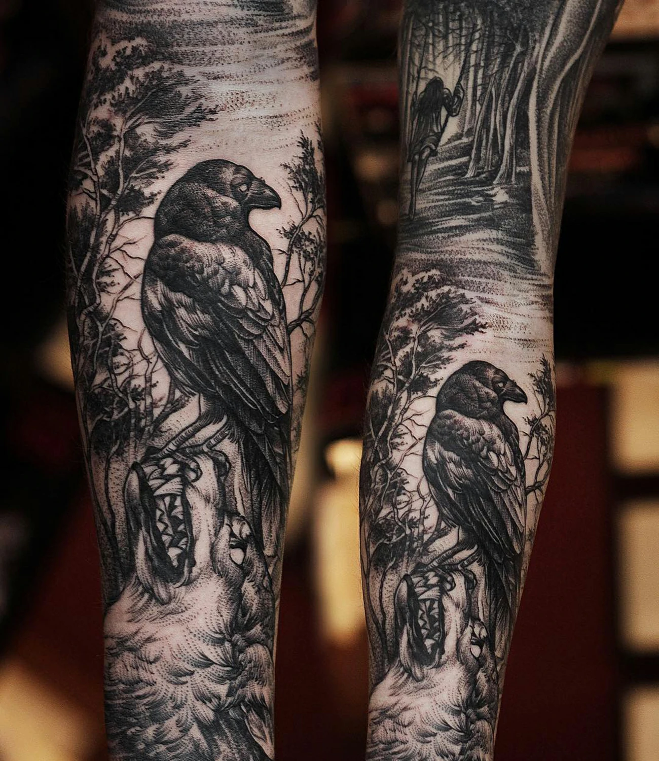 Raven tattoo sleeve: An extensive tattoo design covering the arm, featuring ravens.